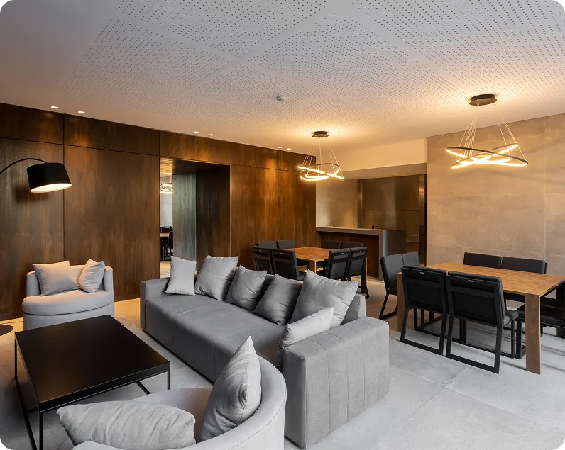 SUM y lobby de DOME Green Soho con living y comedor de uso común